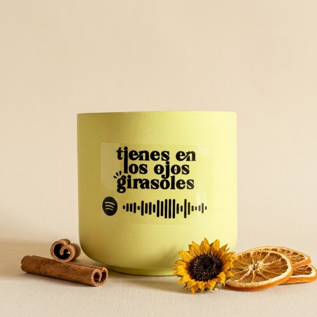 Vela musical de canela y naranja